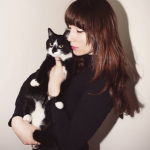 Photgrapher BriAnne Wills with her cat Tucker
